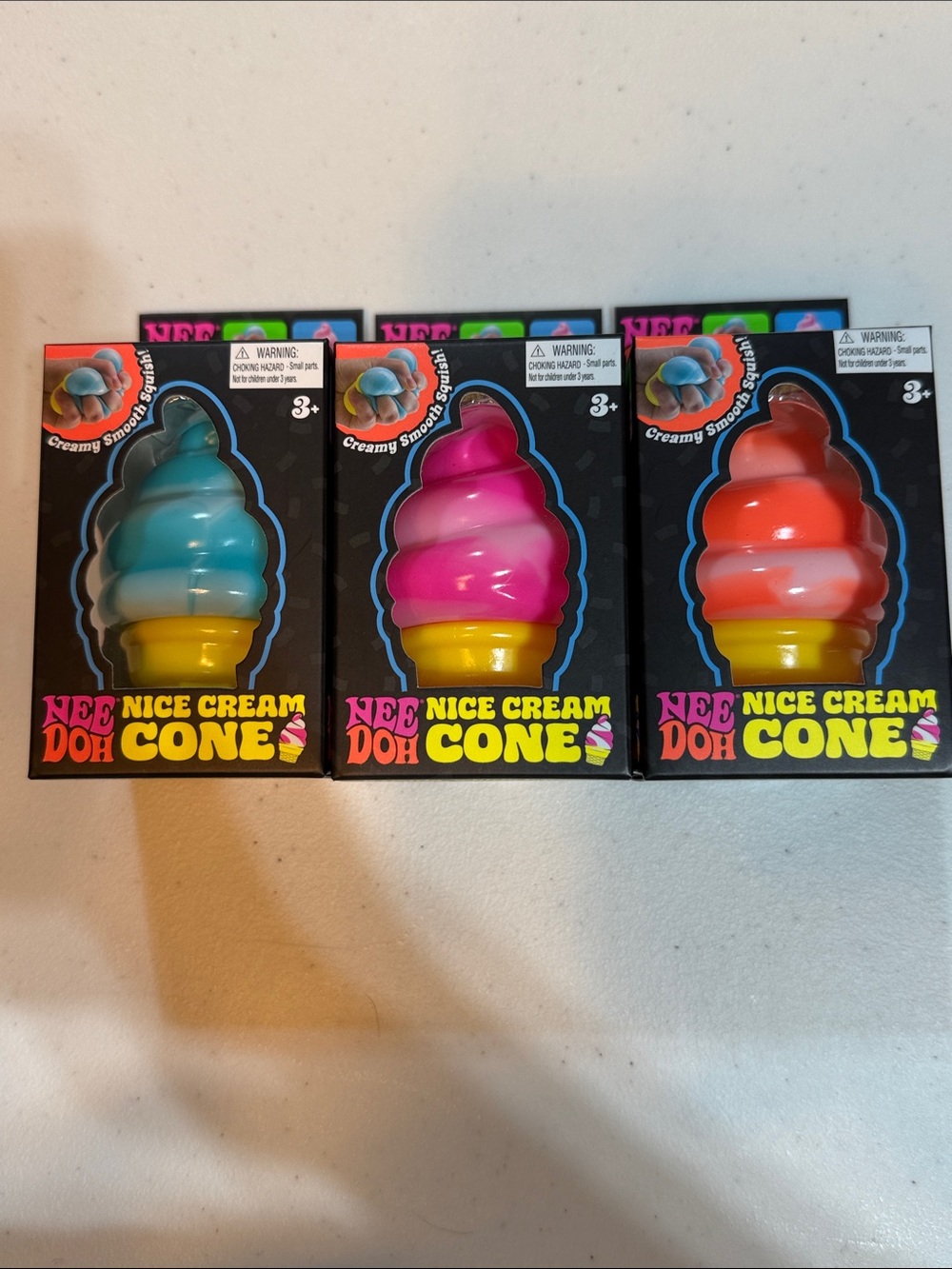 Summers out but Authentic NeeDoh Nice Cream Cones are in! Pink,Blue&Orange Trio